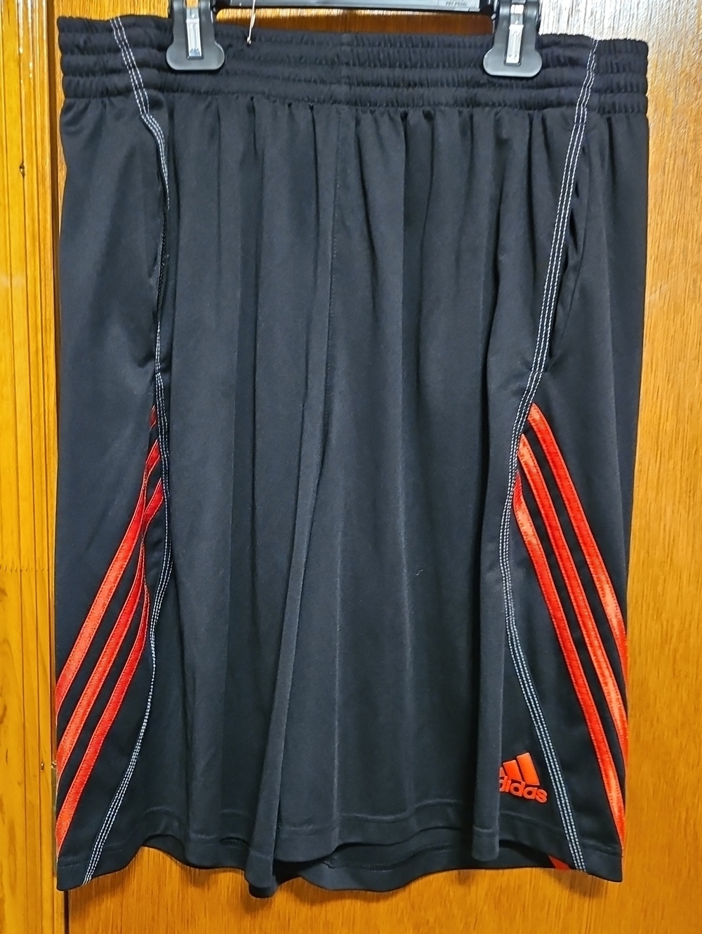 Adidas Men's Black Athletic Shorts with Red Stripe Accents